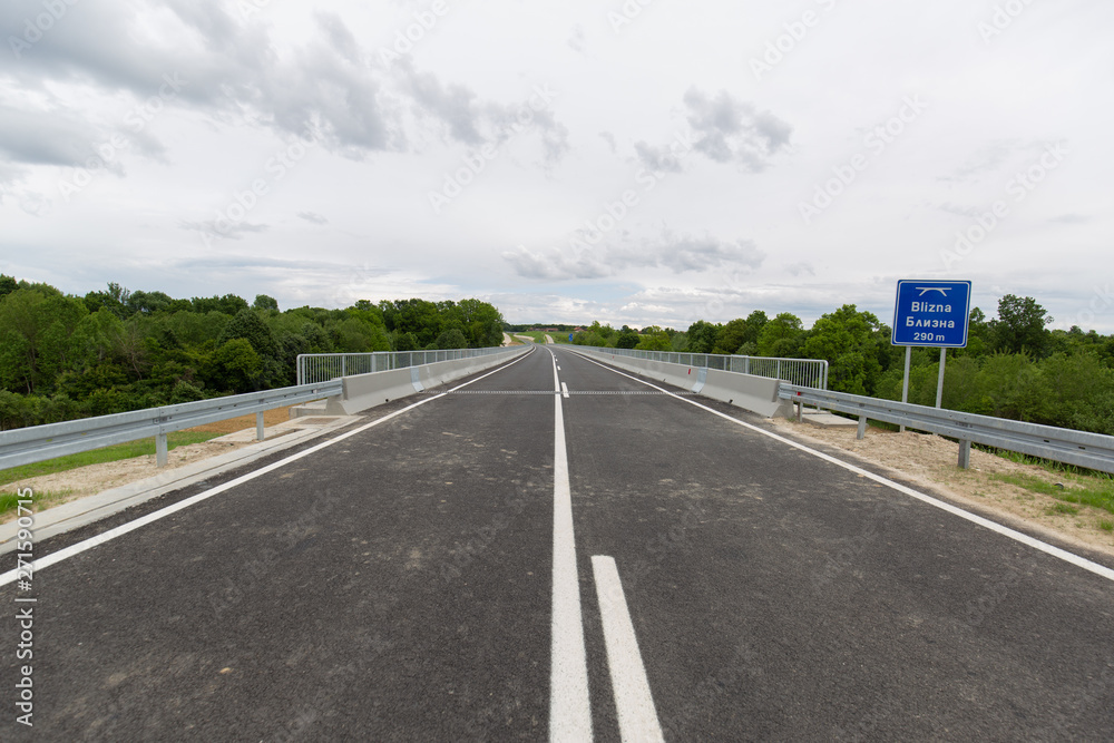 Fototapeta premium A new recently built highway in Brcko district, Bosnia and Herzegovina. The road was built by Spanish company Rubau and is important for the region