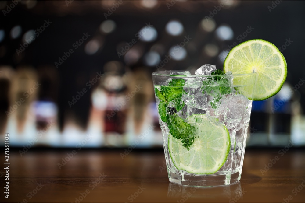 Glass of tasty cocktail on background Glass of tasty cocktail on background