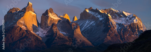 Torres del Paine National Park with snow capped mountains (Cordillera Paine) at sunrise. Chile