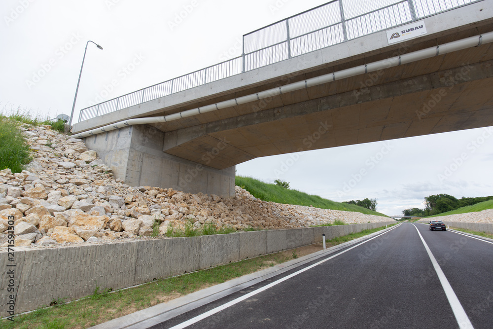 A new recently built highway in Brcko district, Bosnia and Herzegovina. The road was built by Spanish company Rubau and is important for the region A new recently built highway in Brcko district, Bosnia and Herzegovina. The road was built by Spanish company Rubau and is important for the region