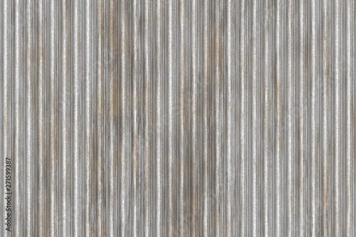 Metal sheet texture. Corrugated metal panel with rust. Old steel background