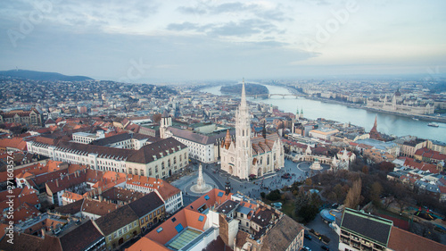 Aerial skyline view of Matthias Church with Danube River and Parliament. Beautiful sunny day at Budapest, Hungary, Europe