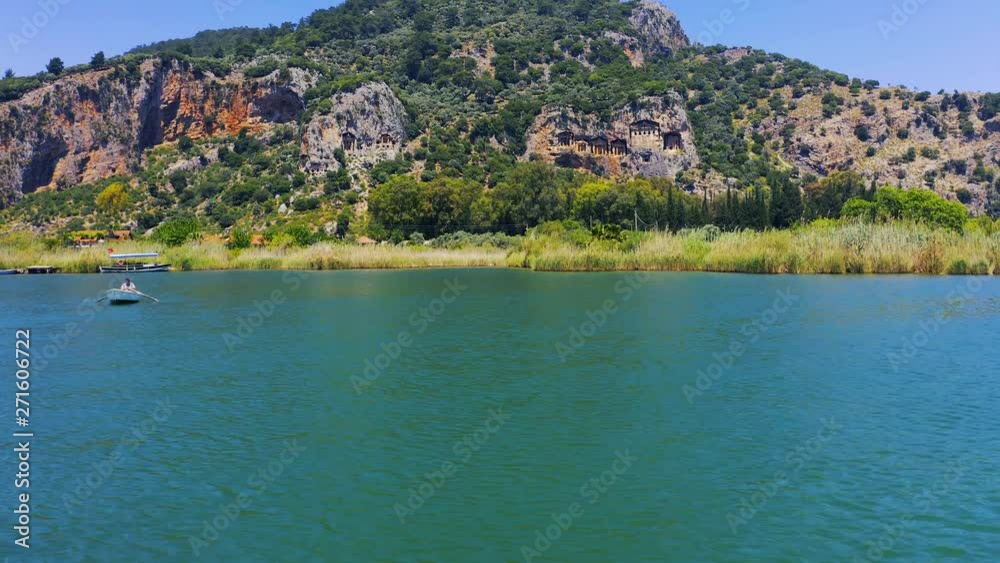 Rock-cut tombs in Myra, on the Dalyan River in Turkey. Lycian tombs. Tilt reveal 4k Rock-cut tombs in Myra, on the Dalyan River in Turkey. Lycian tombs. Tilt reveal 4k