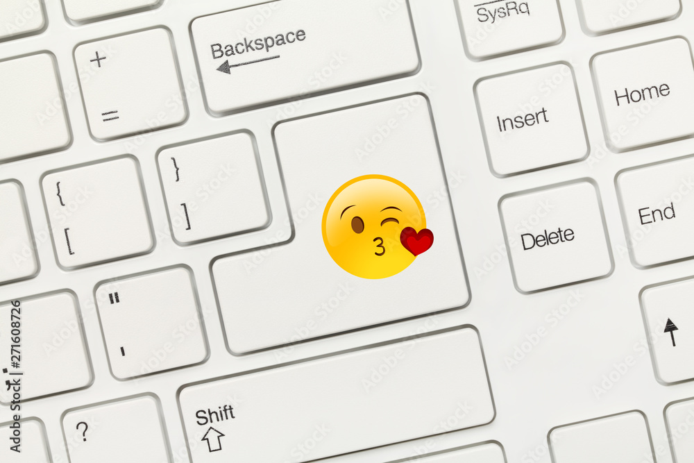 White conceptual keyboard Key with Kissing heart Emoji symbol Stock