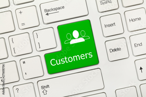 White conceptual keyboard - Customers (green key) photo
