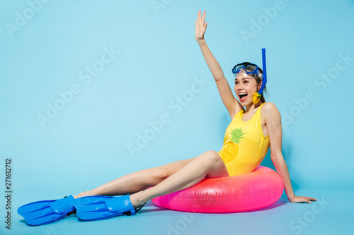 Beautiful young woman wearing swimsuit having fun