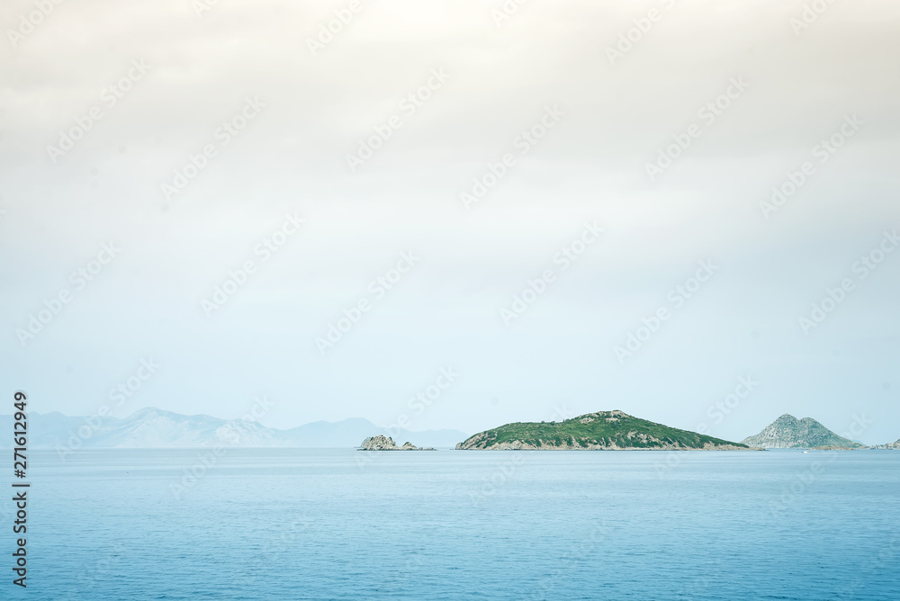 Foggy mountain misty islands covered with fog, calm sea lake landscape background, sunlight in cloudy sky scenery morning weather, Foggy mountain misty islands covered with fog, calm sea lake landscape background, sunlight in cloudy sky scenery morning weather,