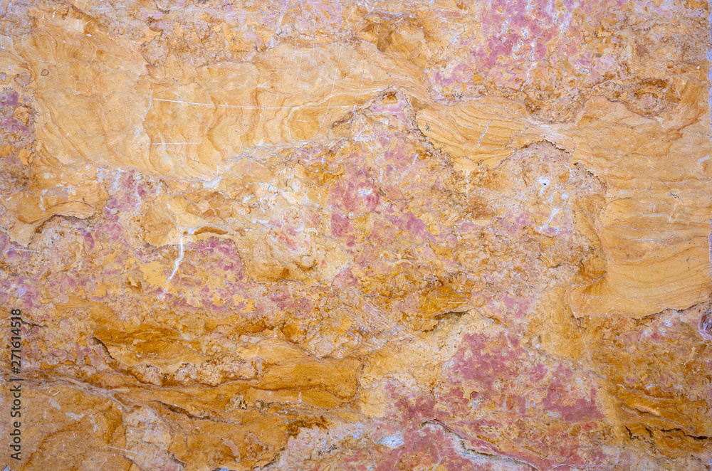 very beautiful texture of natural red marble with lots of inclusions of different colors. Abstract pattern.