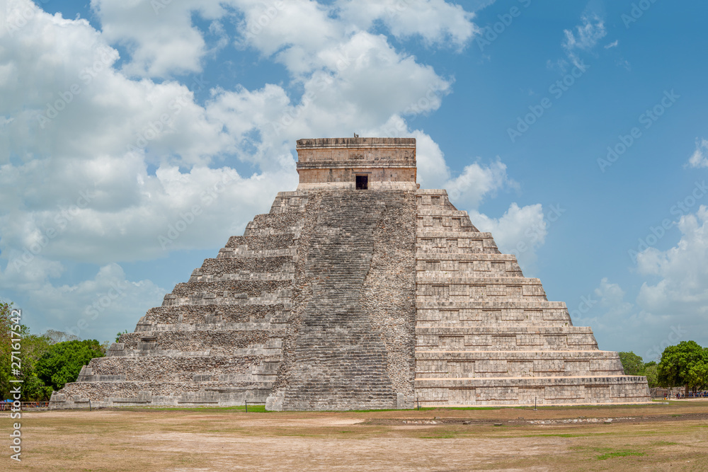 Shooting of the Mayan Pyramid of Kukulkan, known as El Castillo, classified as Structure 5B18, with visible the restored side and the original side, in the archaeological area of Chichen Itza Shooting of the Mayan Pyramid of Kukulkan, known as El Castillo, classified as Structure 5B18, with visible the restored side and the original side, in the archaeological area of Chichen Itza
