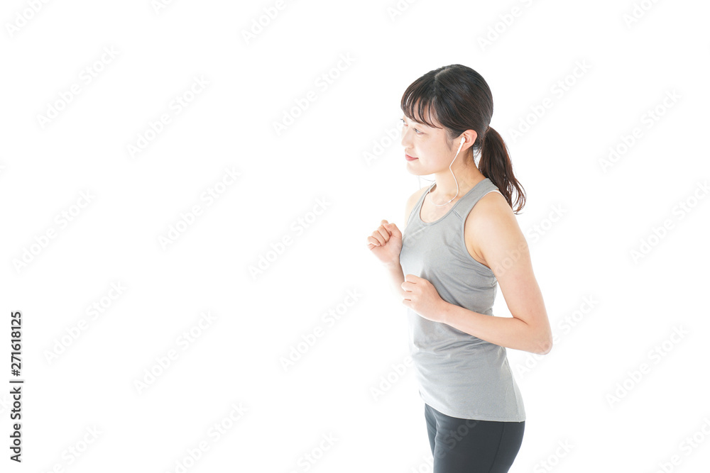 ランニングをする若い女性 ランニングをする若い女性