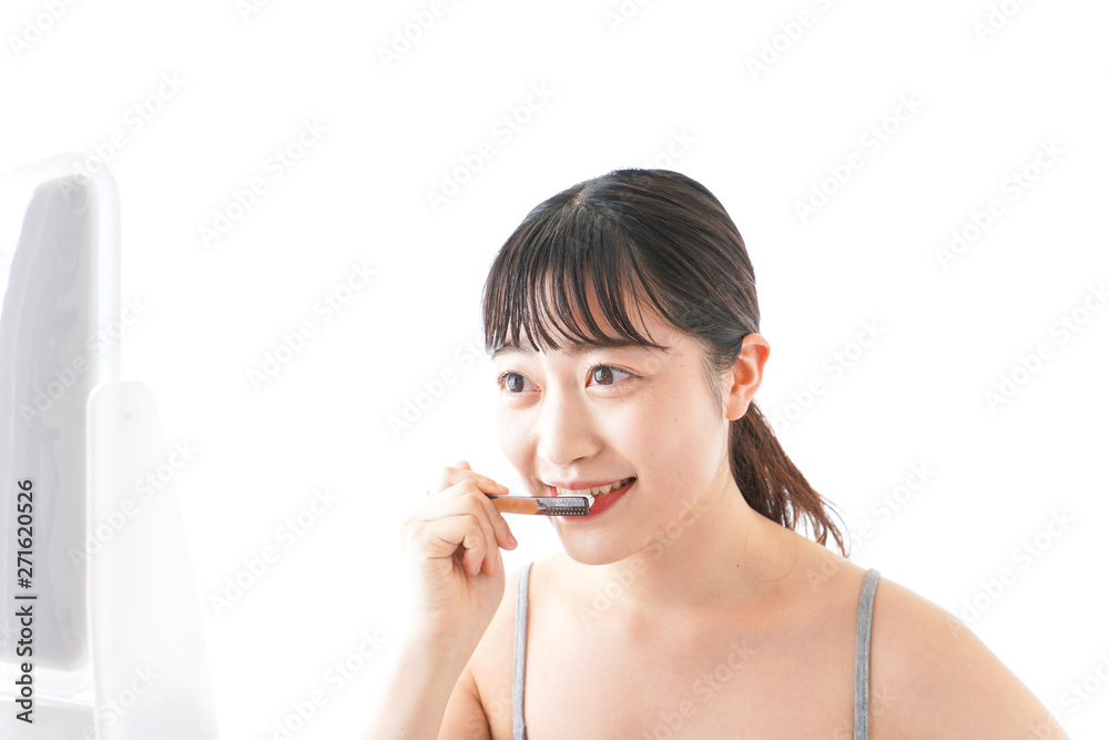 ハミガキをする若い女性 ハミガキをする若い女性