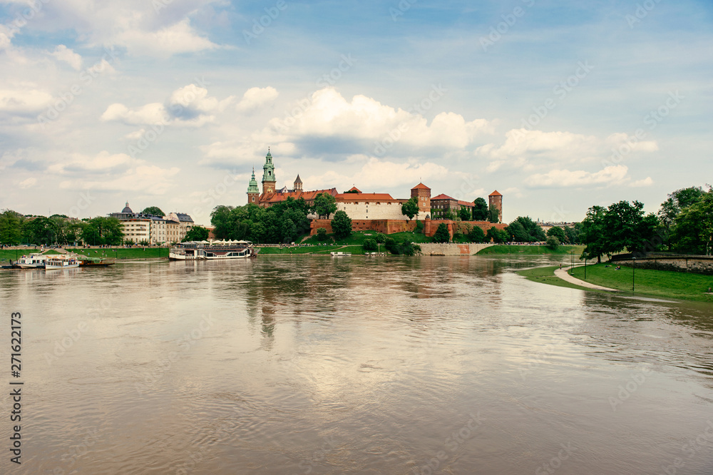 Krakow, Poland - Wawel castle at summer cloudy day. Krakow, Poland - Wawel castle at summer cloudy day.