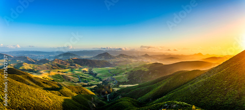 Panorama at Sunset of Mountains and Valley
