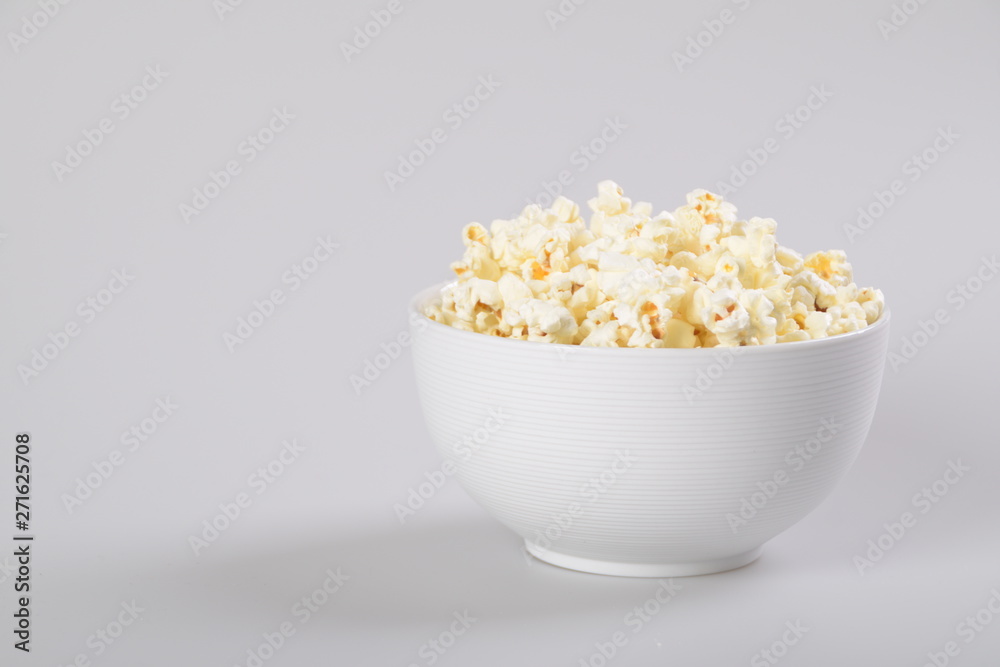 Popcorn bowl isolated on white, clipping path included. Popcorn bowl isolated on white, clipping path included.