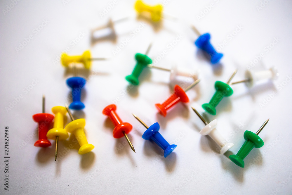 Colourful pin on white paper background. Concept of collection planer work in business and reminder. Colourful pin on white paper background. Concept of collection planer work in business and reminder.
