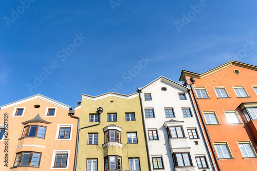Innsbruck, Tyrol, Austria. Colored houses on the Inn River in Innsbruck. Colored houses in Innsbruck.