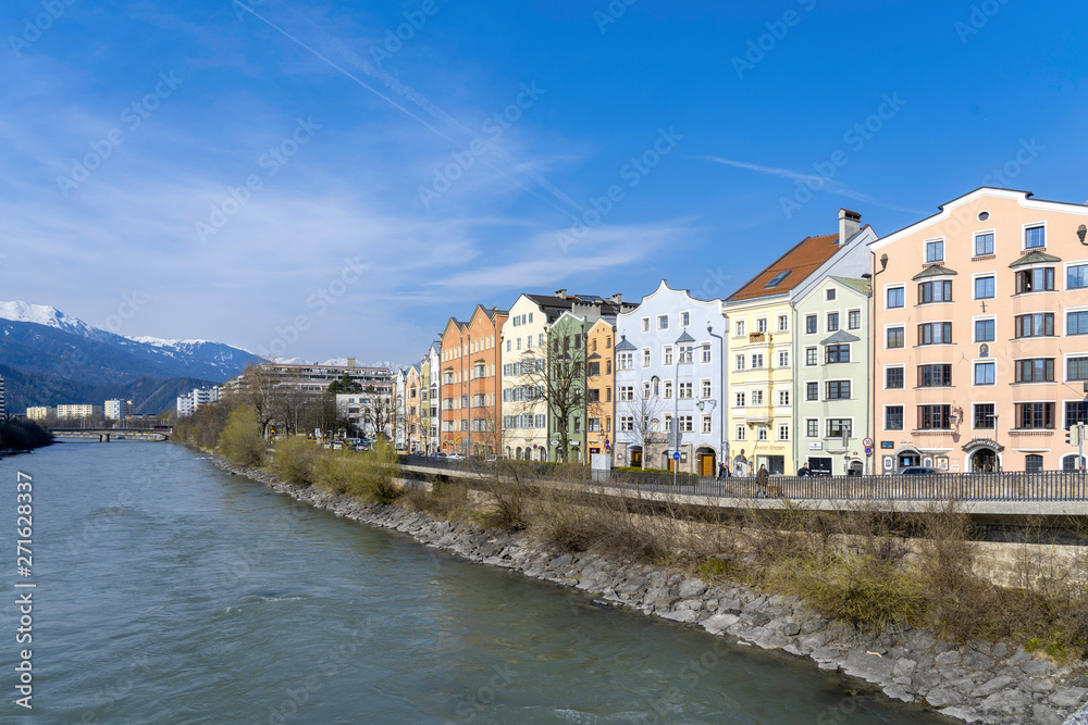 Innsbruck, Tyrol, Austria. Colored houses on the Inn River in Innsbruck. Colored houses in Innsbruck.