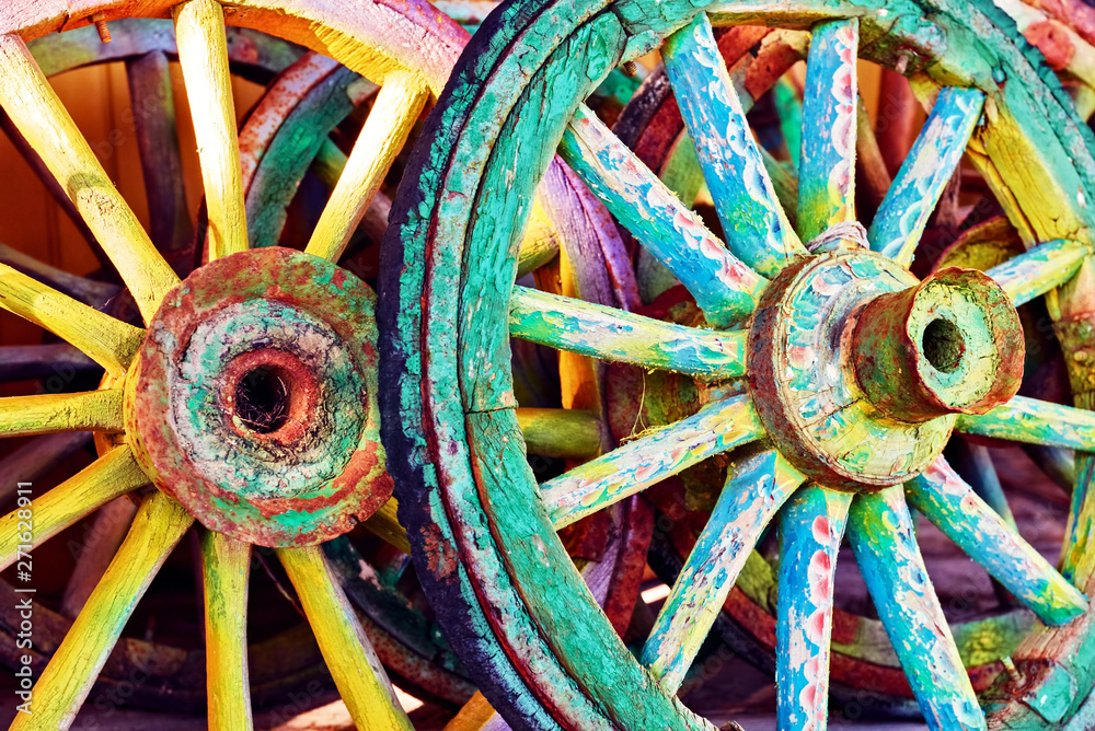 Stack of colorful decorative retro wooden wheels 
