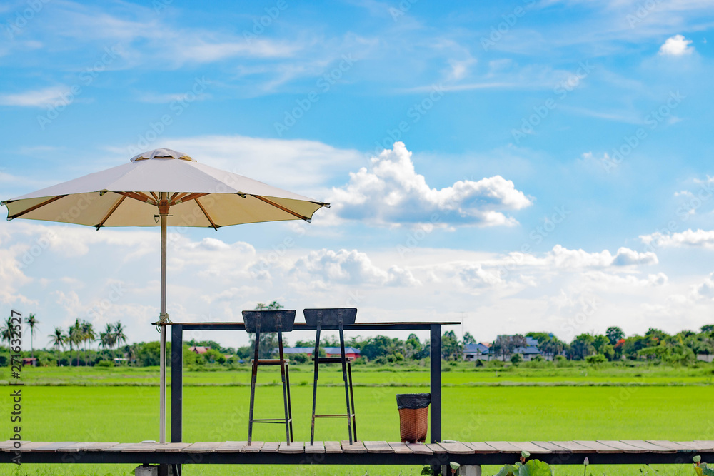umbrella and coffee table at rice field umbrella and coffee table at rice field