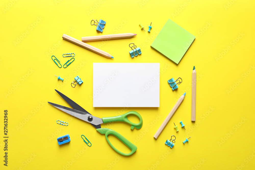 Flat lay composition with scissors and office supplies on color background. Space for text Flat lay composition with scissors and office supplies on color background. Space for text