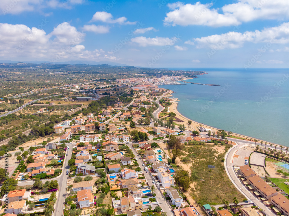 The coastline of L'Ampolla, Catalonia, Spain. Drone aerial panorama