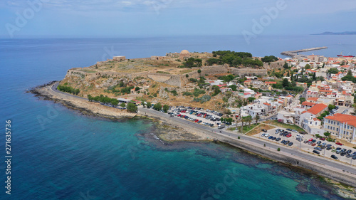 Fototapeta Naklejka Na Ścianę i Meble -  Aerial drone photo of unique old picturesque Venetian port with old lighthouse in the heart of famous city of Rethymno, Crete island, Greece