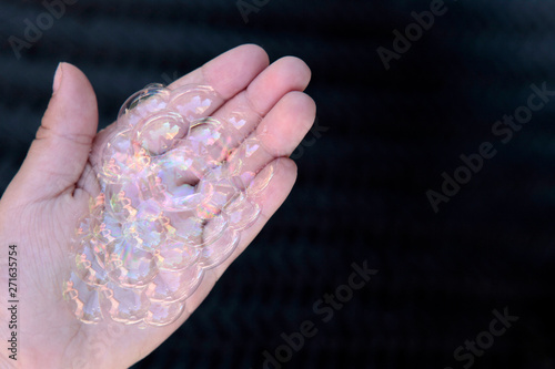 children girl hand soap bubbles 