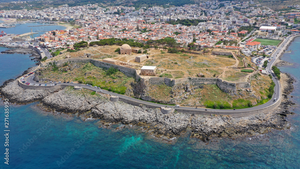 Aerial drone photo of unique old picturesque Venetian port with old lighthouse in the heart of famous city of Rethymno, Crete island, Greece Aerial drone photo of unique old picturesque Venetian port with old lighthouse in the heart of famous city of Rethymno, Crete island, Greece