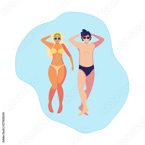 young couple with swimsuit floating in water