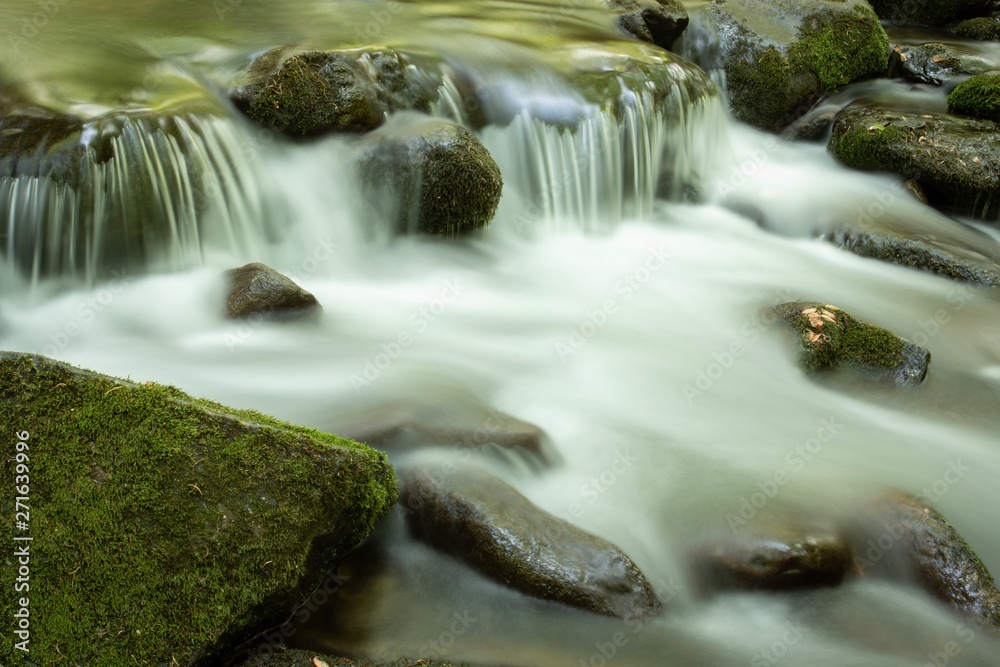 Pristine mountain waterfall in the National Park. Pristine mountain waterfall in the National Park.