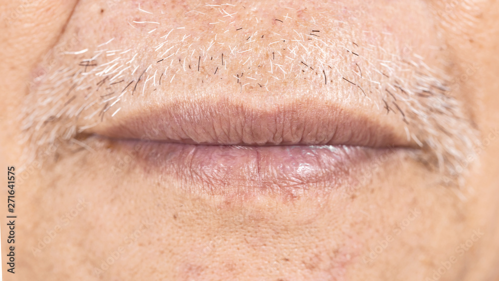 Obraz premium close-up of elderly asian man mouth with wrinkle on face