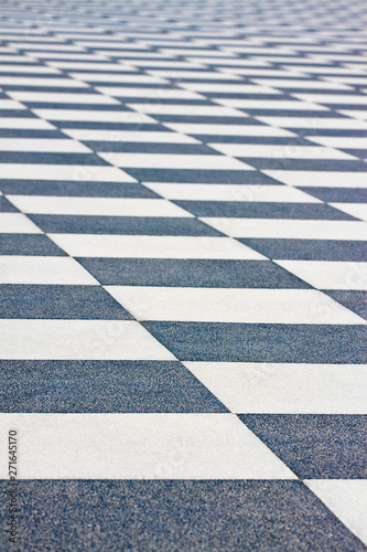 Detail of the pavement of the famous Mascagni square in Livorno with the particular chessboard design (Tuscan-Italy)