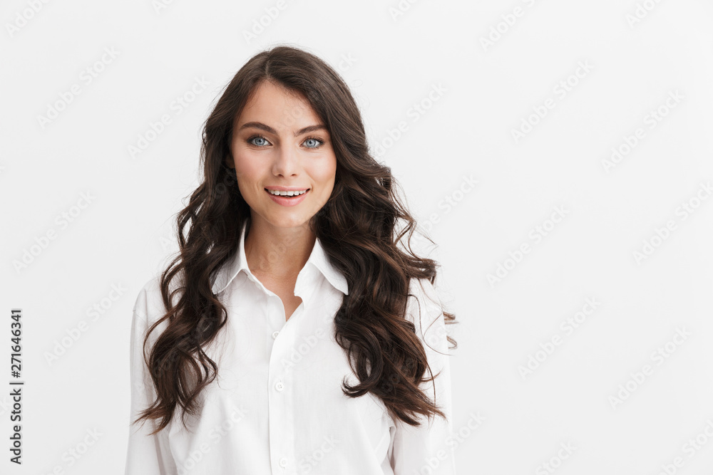 Cheerful young brunette woman wearing shirt Cheerful young brunette woman wearing shirt