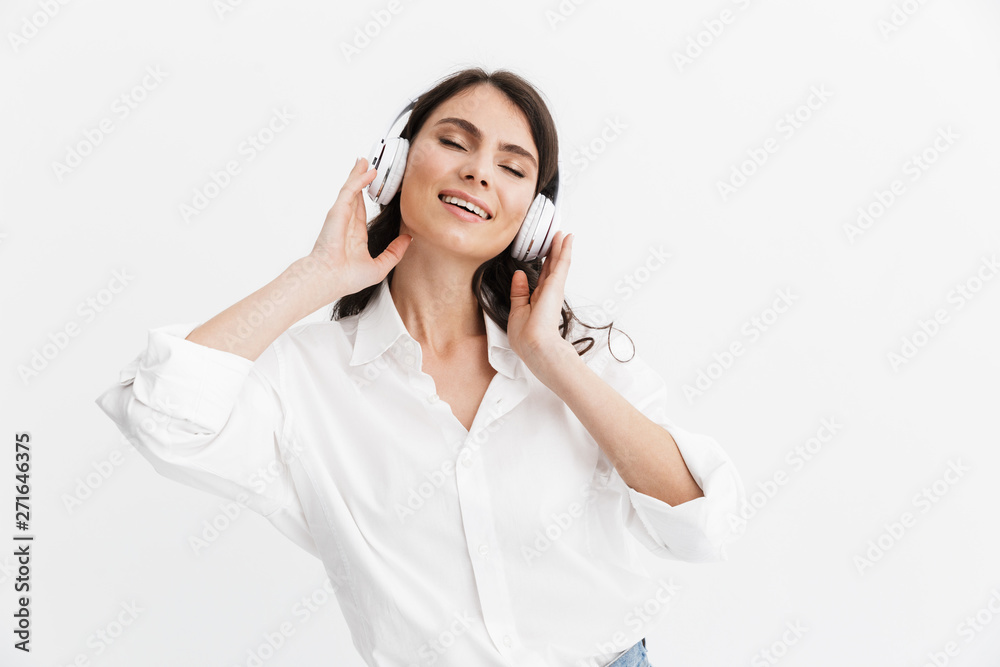 Cheerful young brunette woman wearing shirt Cheerful young brunette woman wearing shirt