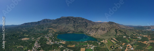Fototapeta Naklejka Na Ścianę i Meble -  Aerial drone panoramic photo of famous natural lake of Kournas with amazing colours and unique nature surrounded by mountains, Chania prefecture, Crete island, Greece