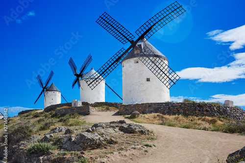 3 Don Quixote windmills with lens flare
