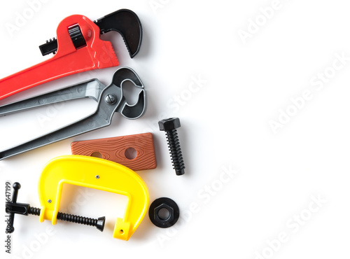 Set of plastic tools isolated on white background,pliers,wrench, nut and bolt
