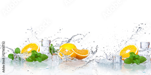 ice cubes, mint leaves with...