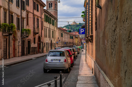 Cars on tight mediterranean street
