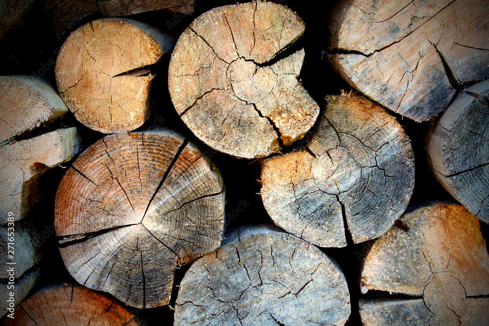 Sawn old logs. Close-up. Background. Texture. Sawn old logs. Close-up. Background. Texture.