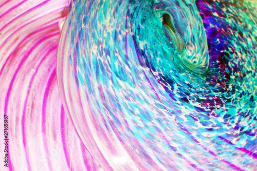 Fototapeta Naklejka Na Ścianę i Meble -  Macro Close Up of Inside a Paperweight Bubbles Glass Shapes Blue and Green Bubbles