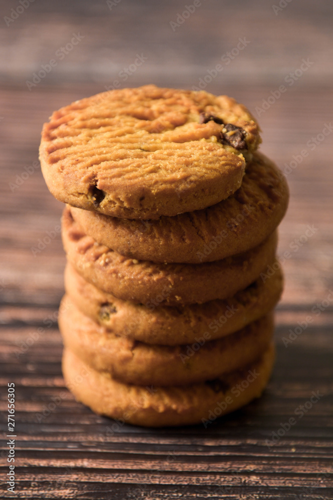 Oat and Chocolate chip cookies on rustic wooden table background Oat and Chocolate chip cookies on rustic wooden table background