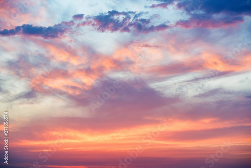 Dramatic sunset and sunrise sky with pink clouds