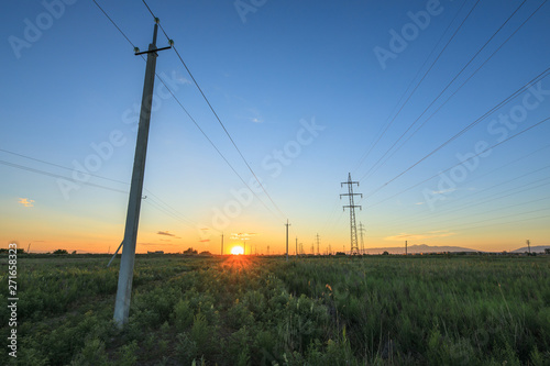 Power towers at the sunset