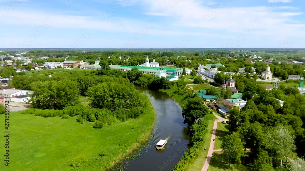 Aerial shot Elias Church on the river Kamenka in Suzdal, oldest part of medieval Russian town Aerial shot Elias Church on the river Kamenka in Suzdal, oldest part of medieval Russian town