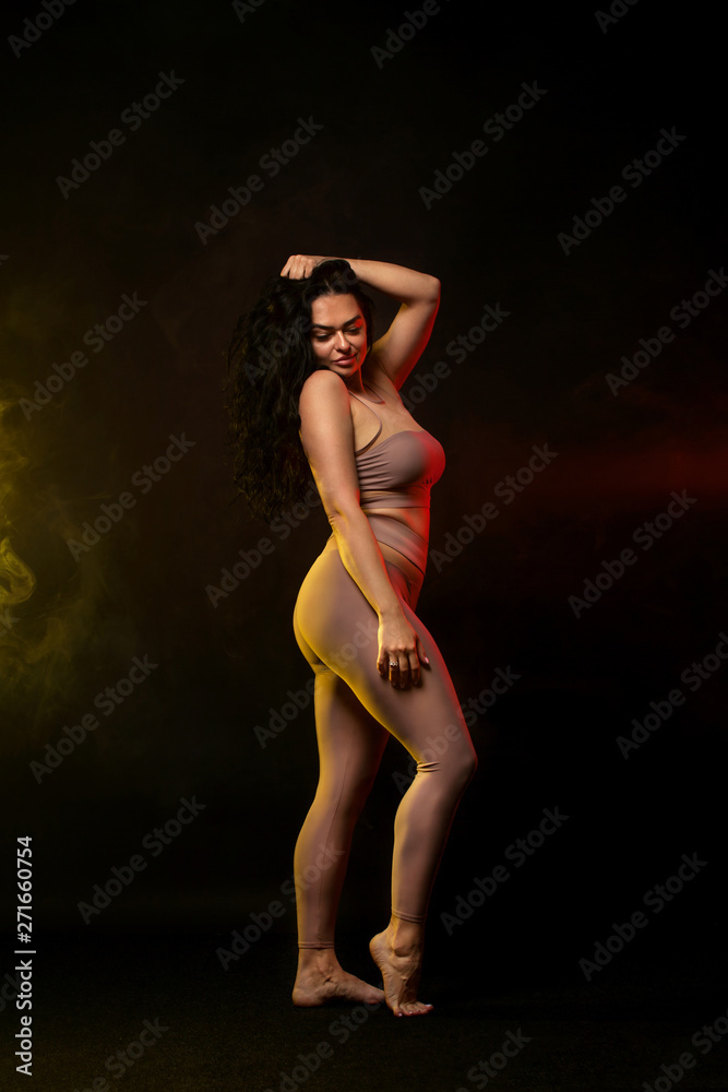Fototapeta premium SIze plus woman, ballydance dancer. Ethnic dance. Belly dancing. Tribal dancing.