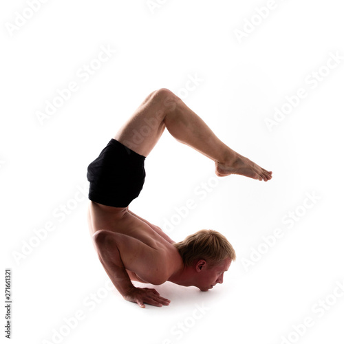 Yoga alphabet. The letter C formed by gymnast body