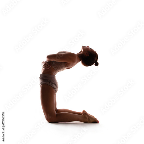 Yoga alphabet. The letter C formed by gymnast body
