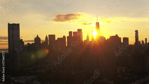Sun sets over New York City, wide aerial