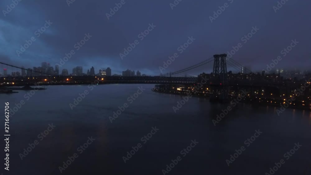 Dusk fog over Williamsburg Bridge, aerial Dusk fog over Williamsburg Bridge, aerial